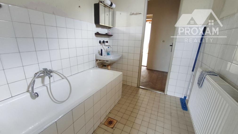 Na predaj priestranný  6-izbový rodinný dom s potenciálom!