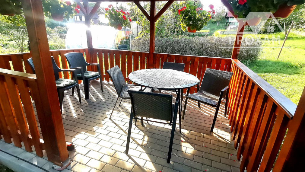 Predaj,záhradná chatka s dreveným altánkom a záhradou v meste Poltár