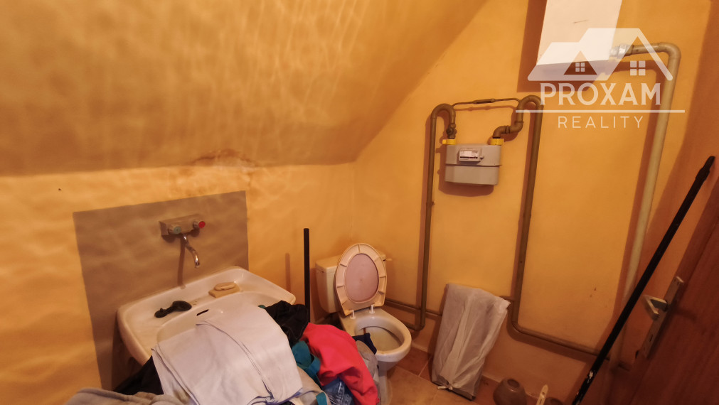 Na predaj rodinný dom, prístavba, garáž pri parku v Lučenci