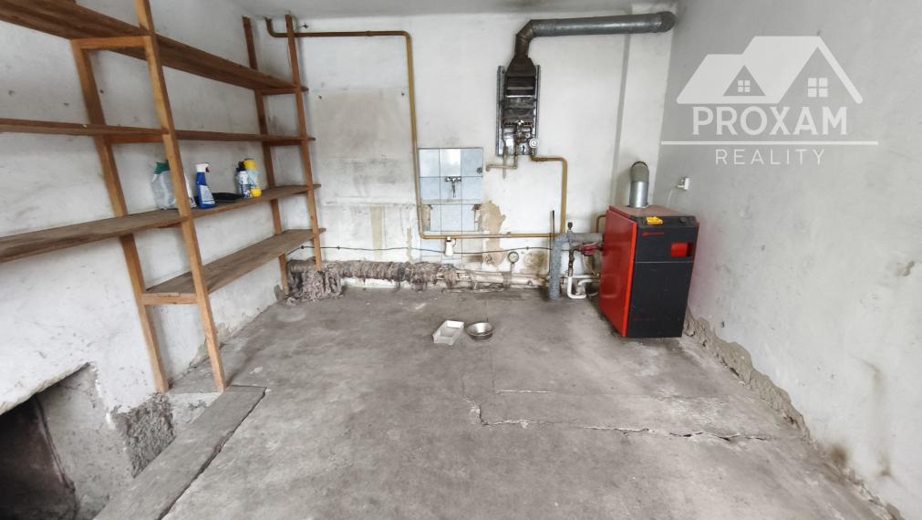 Na predaj rodinný dom, prístavba, garáž pri parku v Lučenci