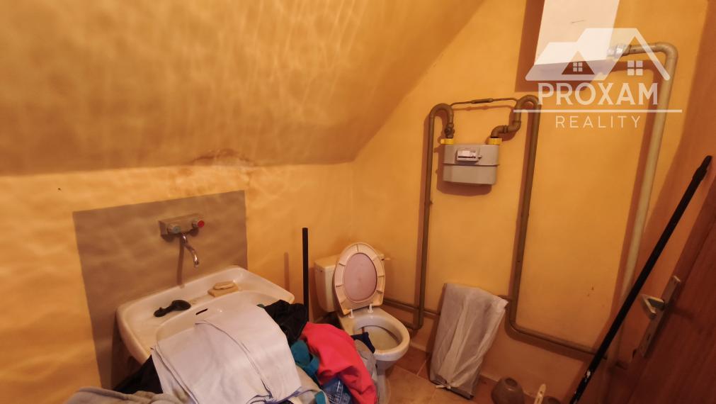 Na predaj rodinný dom, prístavba, garáž pri parku v Lučenci