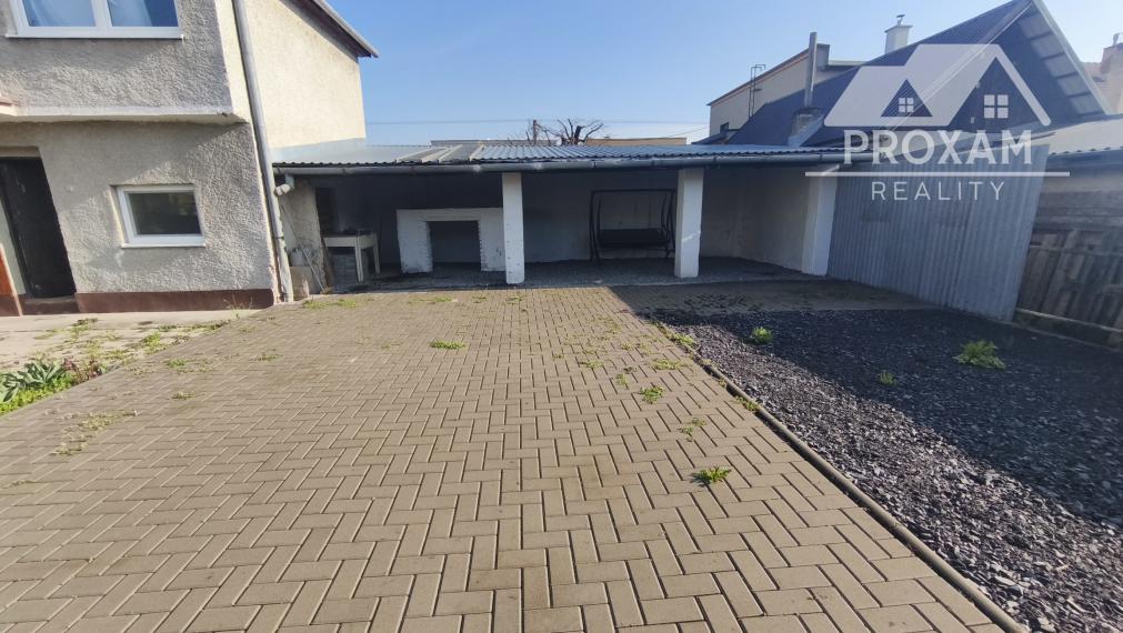 Na predaj rodinný dom, prístavba, garáž pri parku v Lučenci