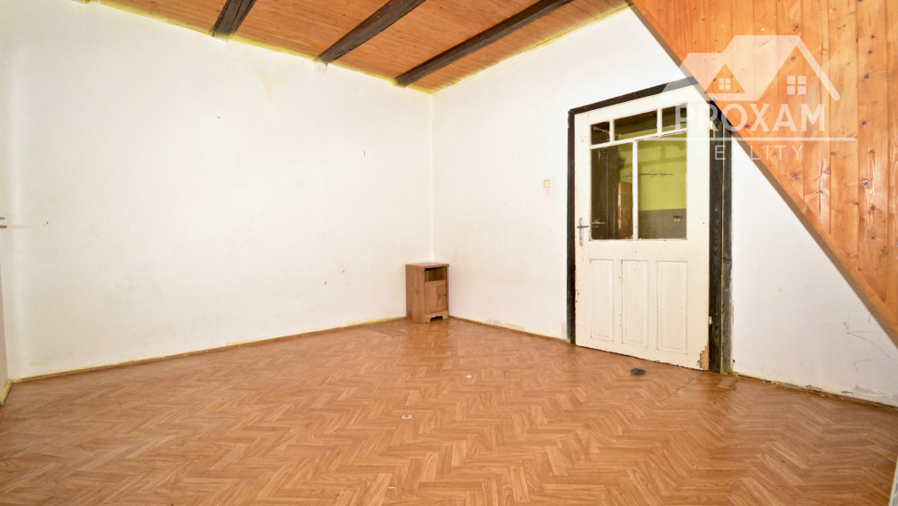 Dom s veľkorysým pozemkom a vlastným ovocným sadom