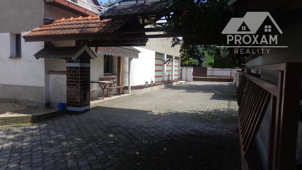 Znížená cena. Predaj rodinného domu a komplex budov v Lučenci časť Opatová